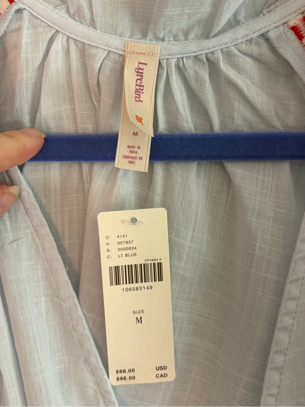 NWT Anthropologie Light Blue Peasant Blouse with Red Trim - Picture 2 of 5